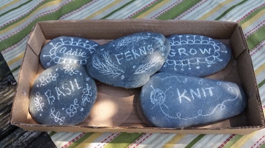 The Knitting Group often does a craft in addition to knitting. This day they drew on rocks.